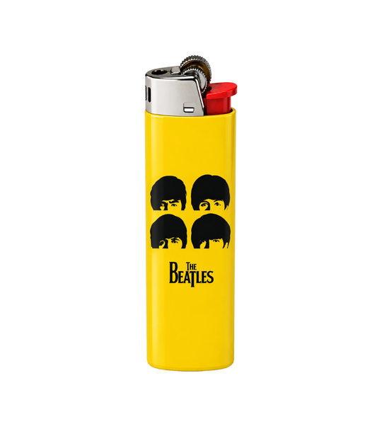 A yellow metal lighter featuring the black silhouettes of The Beatles and the 'The Beatles' logo printed on the front, with a silver metal top and a red ignition button, shown against a plain white background.